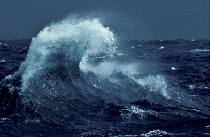 A cresting ocean wave
